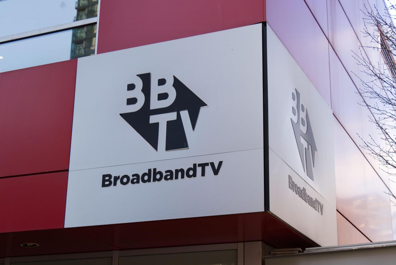 BroadBandTV logo on a white background on a red building.