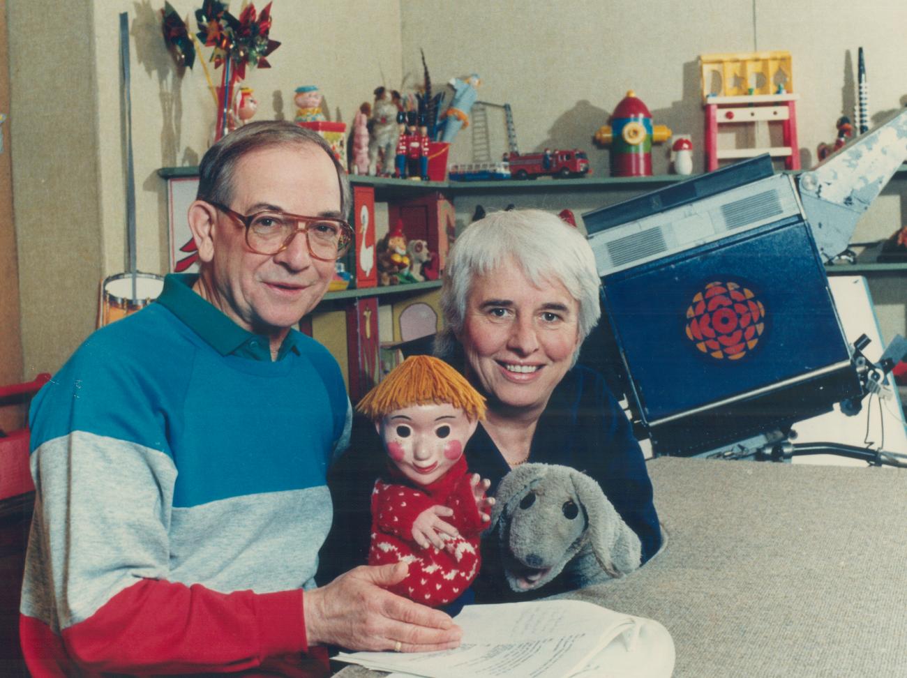 Ernie Coombs and a woman with two puppets.