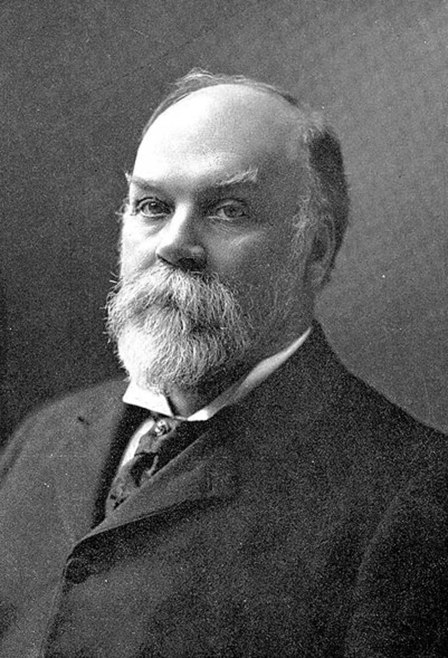 black and white photo of Timothy Eaton with full beard.