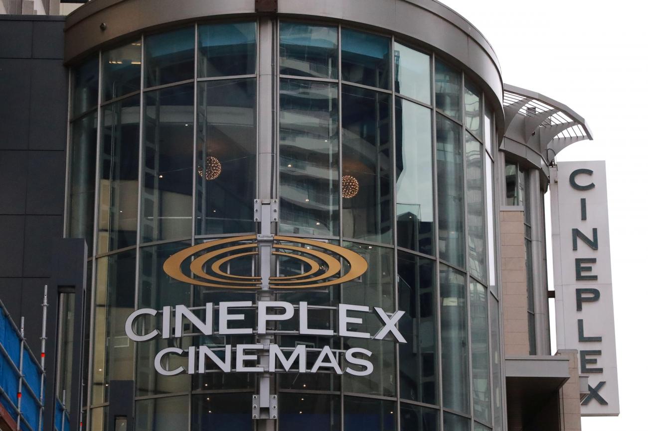Glass rotunda building with Cineplex Cinemas sign on the front.